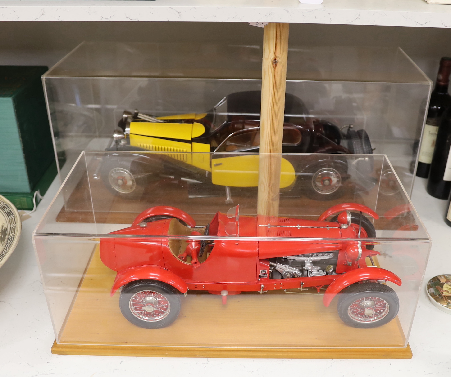 Two kit built cars with perspex covers